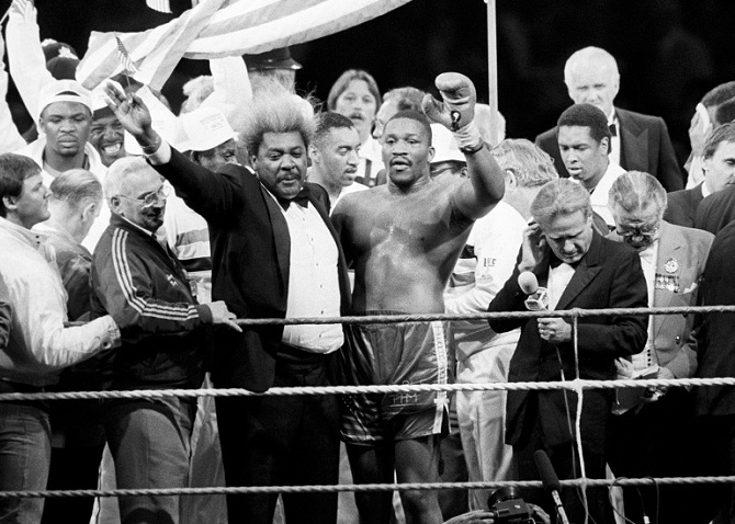 Witherspoon celebrates his win over Frank Bruno with Don King: "You 