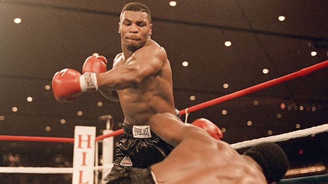 1986: Tyson demolishes Berbick to become the youngest heavyweight champ in history.