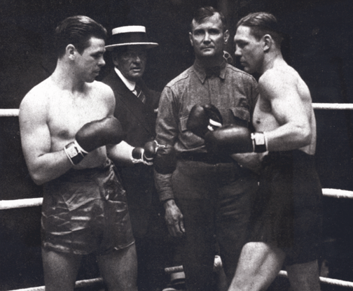 Greb (right) squares off against fellow great Mickey Walker.