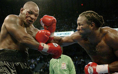 Tyson taking a beating from Lennox Lewis.