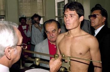 A 22-year-old Chavez weighs in for his bout with "Azabache" Martinez