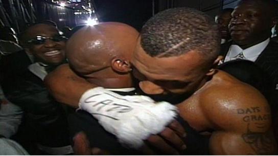 Tupac congratulates Tyson after the fight. Shortly after, he was shot to death. 
