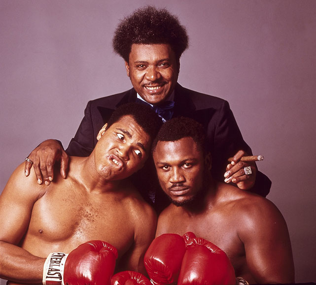 Promoter King poses with the two rivals before Fight III.
