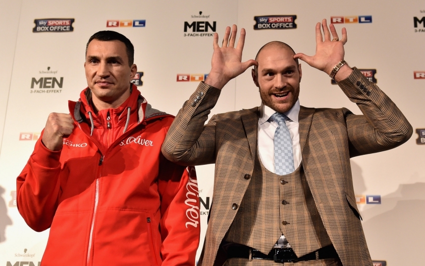 DUESSELDORF, GERMANY - NOVEMBER 24: Tyson Fury jokes next to Wladimir Klitschko as they have their stare off during a press conference at Rheinterassen on November 24, 2015 in Duesseldorf, Germany. (Photo by Dennis Grombkowski/Bongarts/Getty Images) ***BESTPIX***