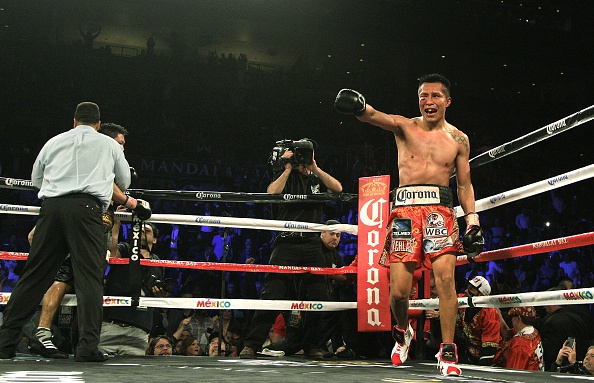 Francisco Vargas celebrates after the referee stops the bout in the ninth round.