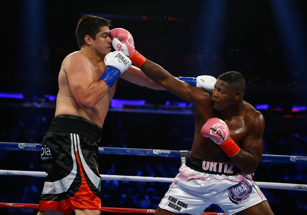 NEW YORK, NY - OCTOBER 17: Luis Ortiz punches Matias Ariel Vidondo during their WBA Interim Heavyweight title fight at Madison Square Garden on October 17, 2015 in New York City. (Photo by Al Bello/Getty Images) ORG XMIT: 567656971 ORIG FILE ID: 493144740