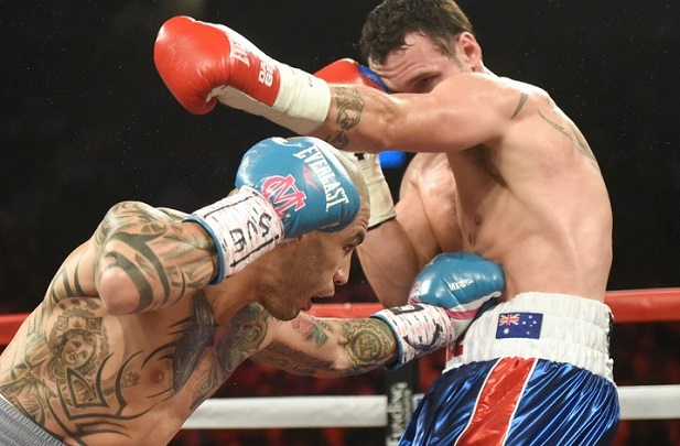 A solid body jab by Cotto deflates Geale. 